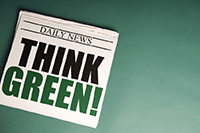 newspaper with 'Think Green!' headline