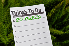notepad that says go green